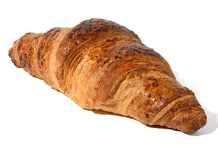 Baked croissant on a white isolated background, a Food & Drink Photo by ndanko