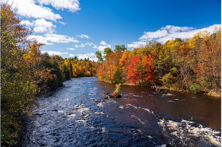 Saranac river flows through multi, a Nature Photo by Backyard Stock