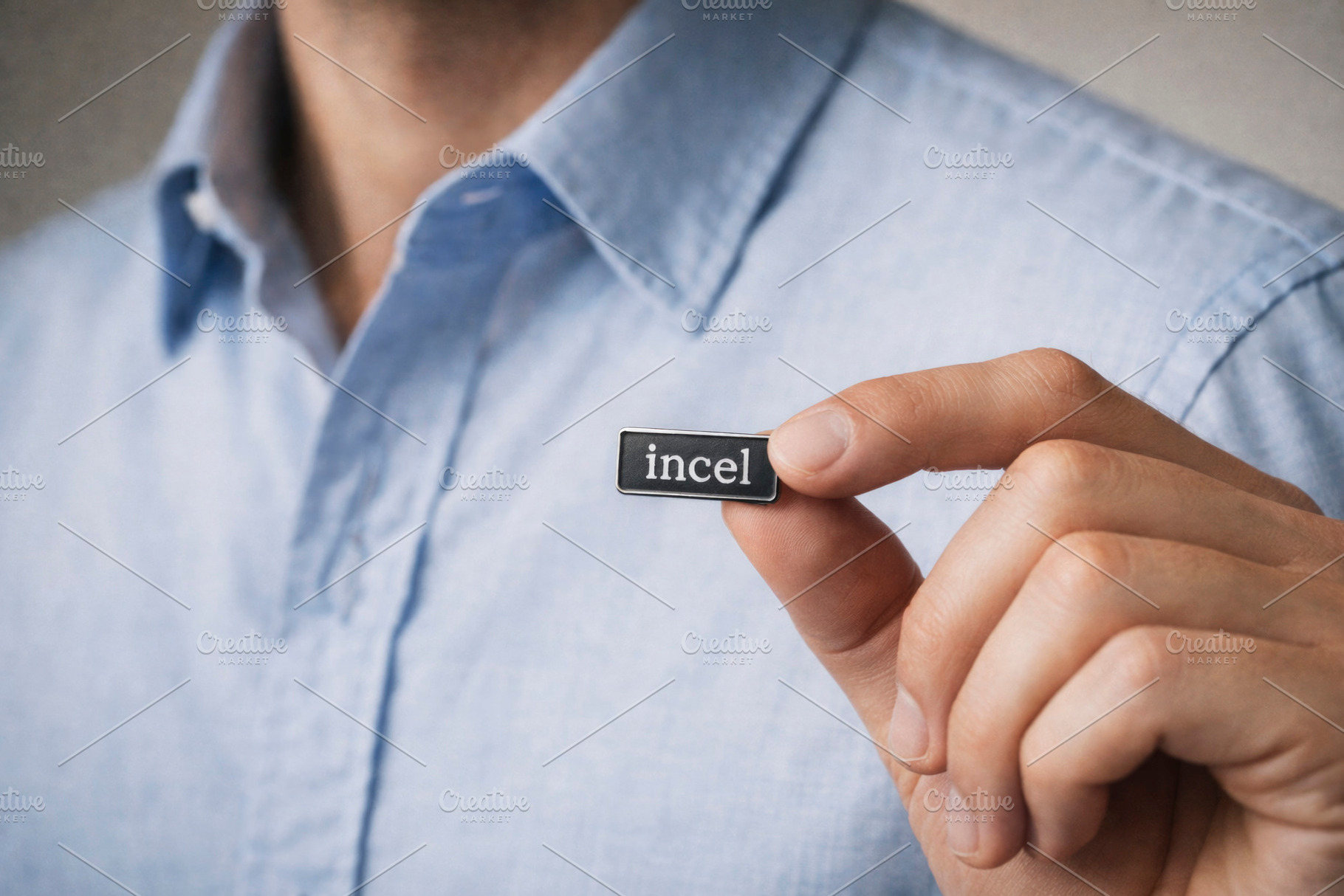 a man holding an incel pin, generative AI, a Photo by Nito