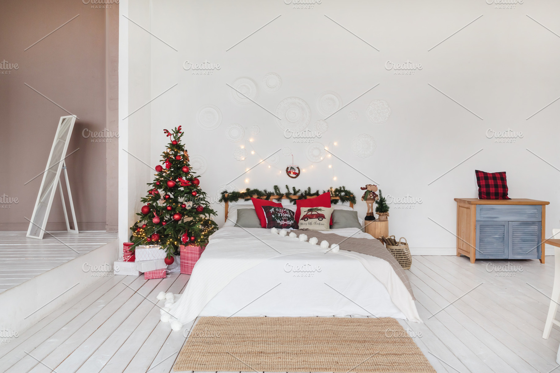 White loft style bedroom with red, a Holiday Photo by Konstantin K.