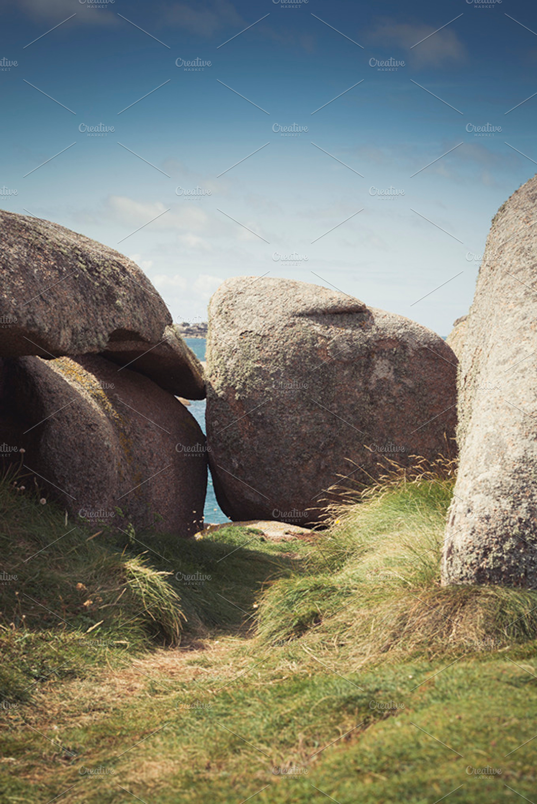 The stones containing stones, grass, and path, a Nature Photo by Art Cascadea