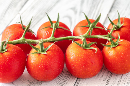 Ripe tomato branch, a Food & Drink Photo by Alexander Prokopenko