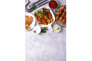 Assortment of grilled bbq meat and, a Food & Drink Photo by Yulia Furman