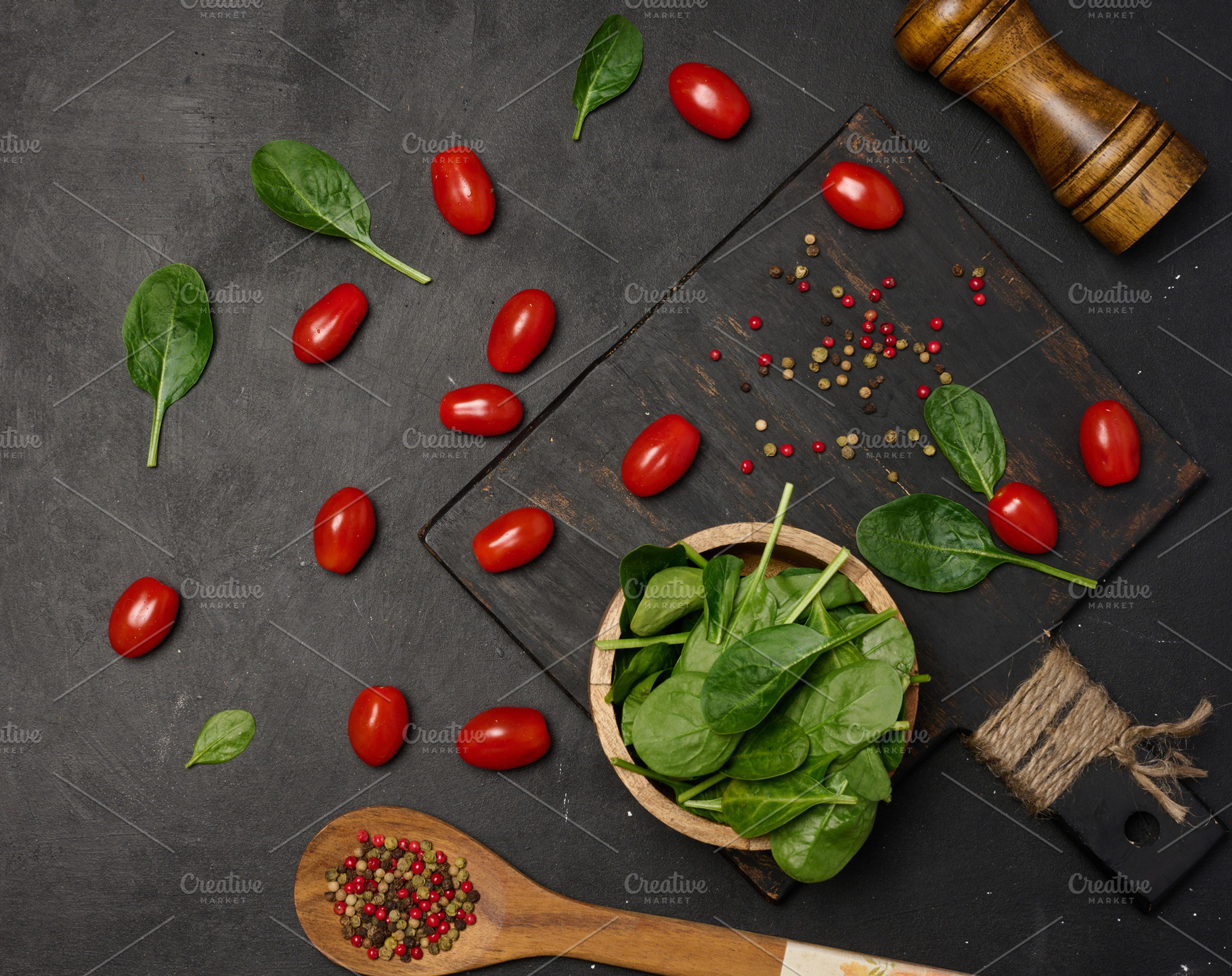 Fresh spinach leaves, cherry tomatoes, and mixed peppercorns on, a Food & Drink Photo by ndanko
