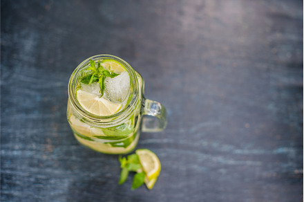 glass of mojito with lime and mint, a Food & Drink Photo by Elizaveta Galitskaya