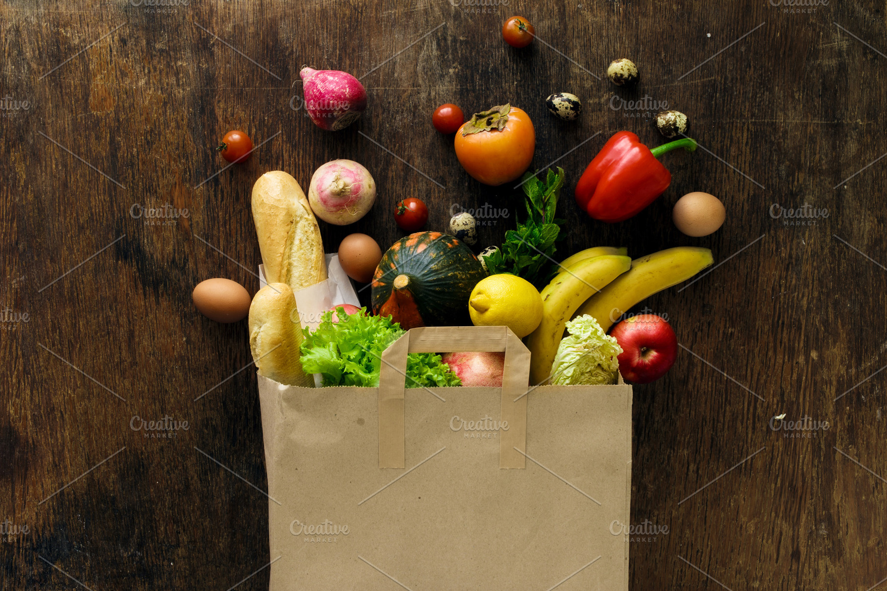 Paper bag of different health food featuring grocery, health, and top, a Food & Drink Photo by KucherPhoto