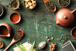 Tea Leaves and Teaware Flat Lay with Rustic Green Background, a Food & Drink Photo by Natalia Klenova's Shop