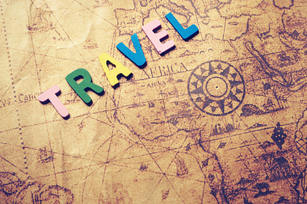 Travel words on old map stock photo containing travel and map
