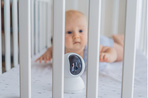 Baby monitor camera placed inside a, a Technology Photo by Elizaveta Galitskaya