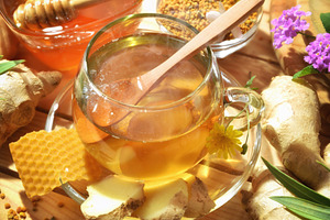 Honey and ginger infusion on wooden table with natural products, a Food & Drink Photo by Davizro's Market