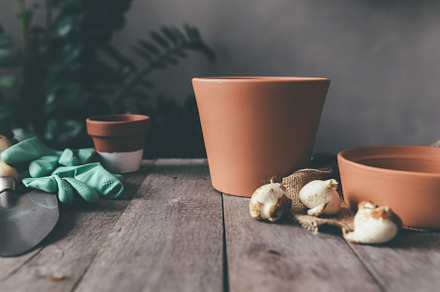 Ceramic pots on old wooden table, a Background Photo by Lenor4ik
