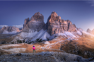 Woman on the hill and mountain peaks, a Person Photo by den-belitsky