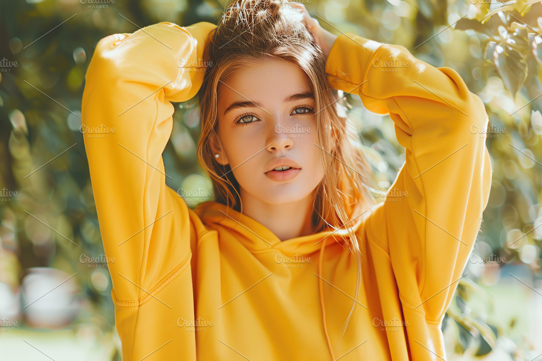 Young pretty woman in yellow sweatshirt in summer park, a Beauty & Fashion Photo by AlyaAnd