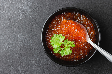Red salmon caviar with parsley