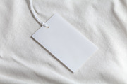 Clothes label tag blank white mockup, an Advertising Mockup by Olha Klein (Thumbnail 2 of 3)