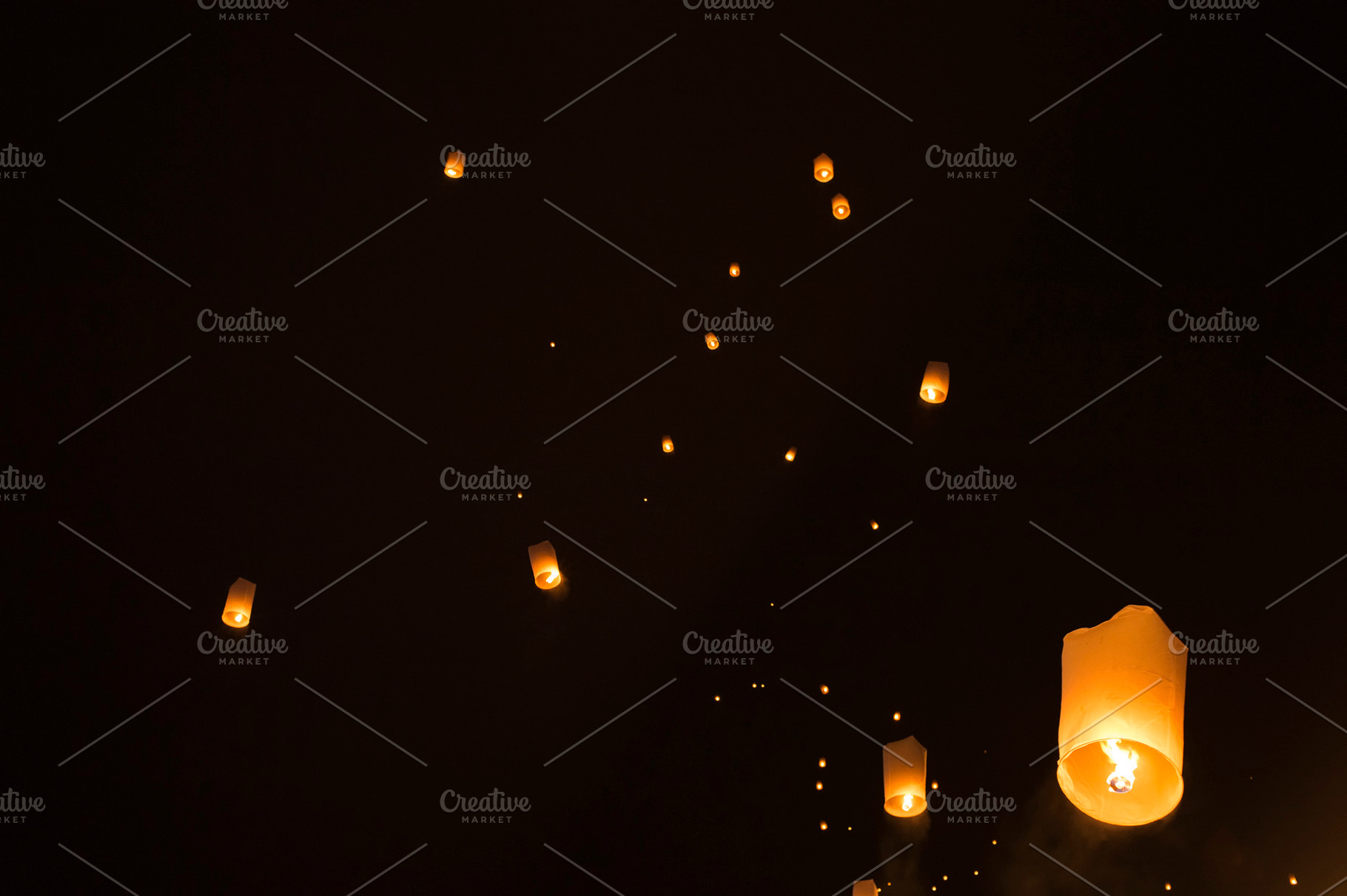 Sky lanterns glowing in night featuring lanterns, night, and sky, a Holiday Photo by joyt