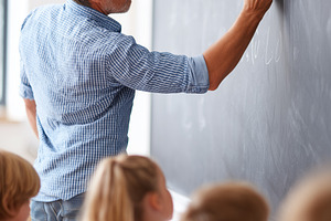 Male teacher explaining math, a School & Education Photo by MistyDay
