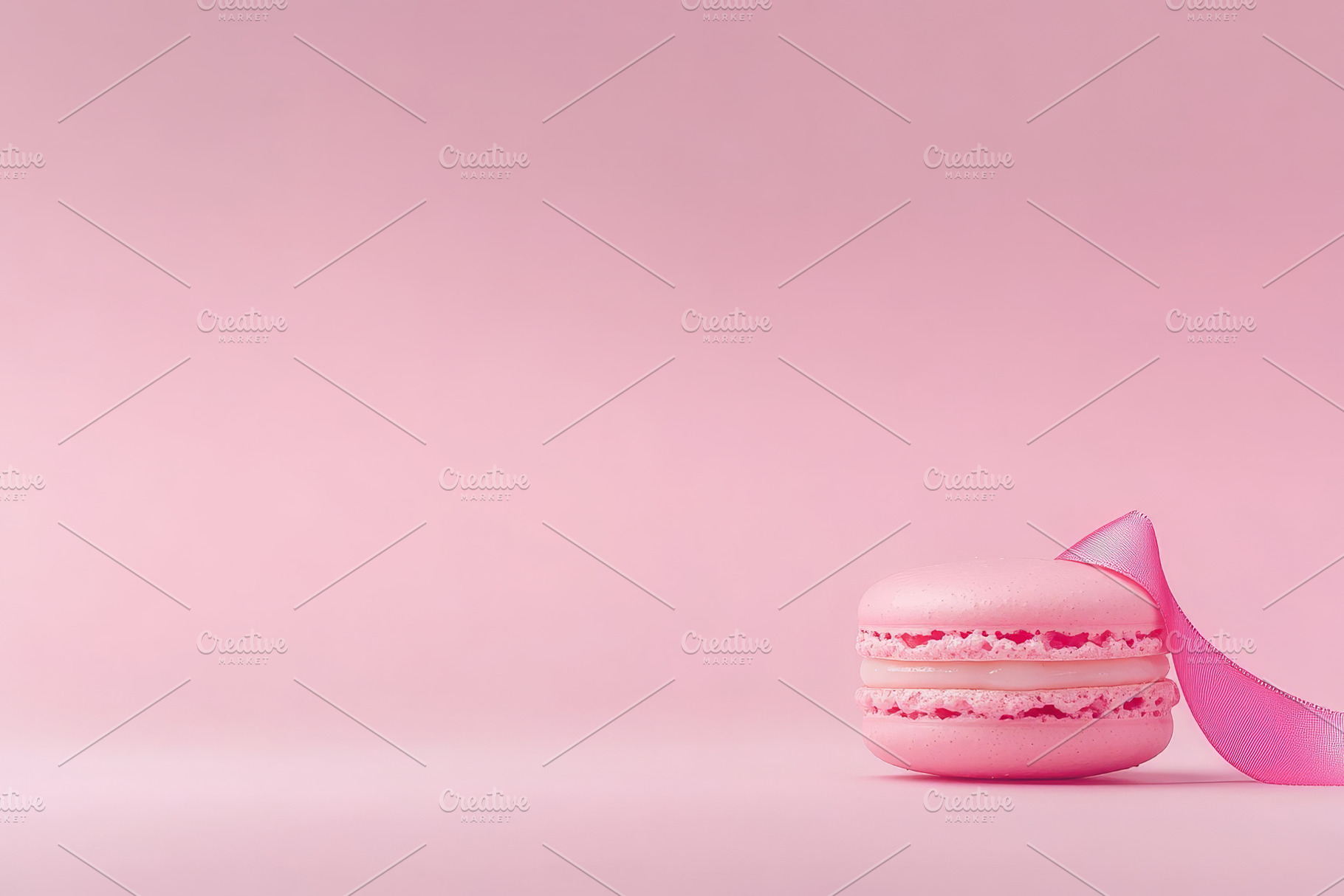 Delicate Pink Macaron with Ribbon, a Food & Drink Photo by Hamza067