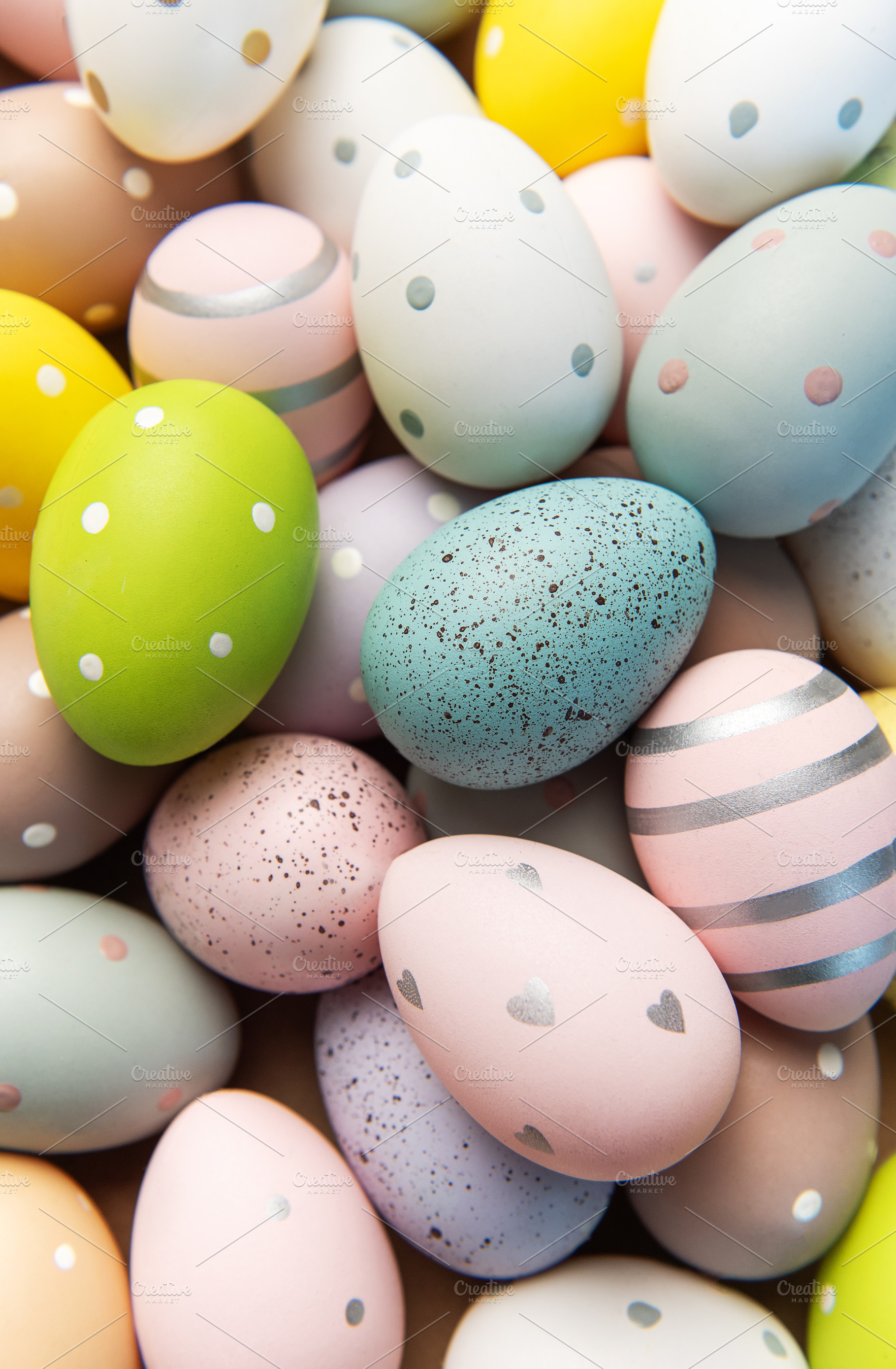 Pastel colored easter eggs with various patterns, a Holiday Photo by Olena Rudo
