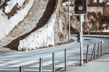 Urban traffic light and a crosswalk, a Transportation Photo by SkyNext