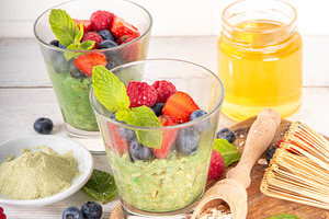 Overnight matcha oatmeal with fresh berries, a Food & Drink Photo by Rimma