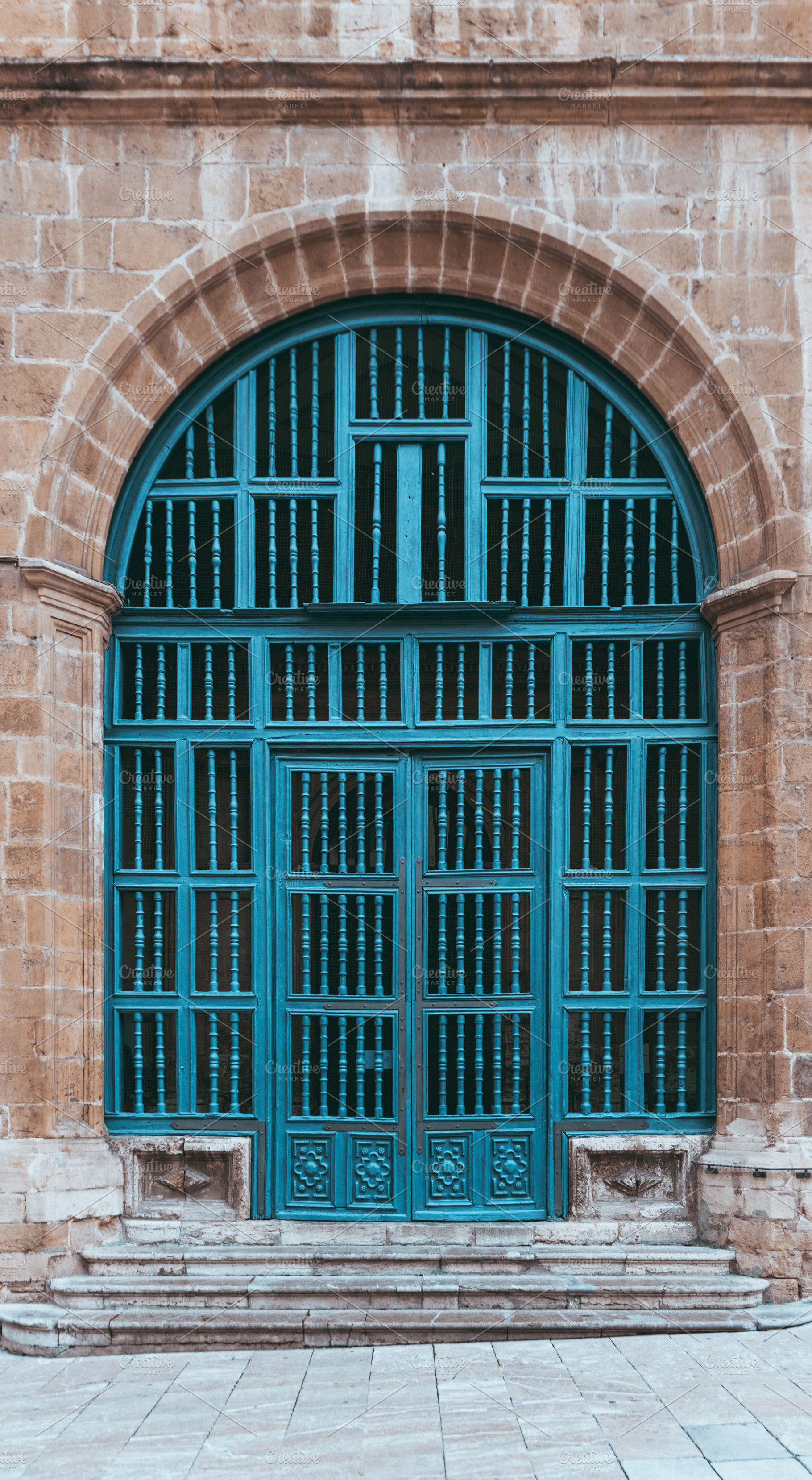 Blue arched vintage doorway facade, an Architecture Photo by SkyNext