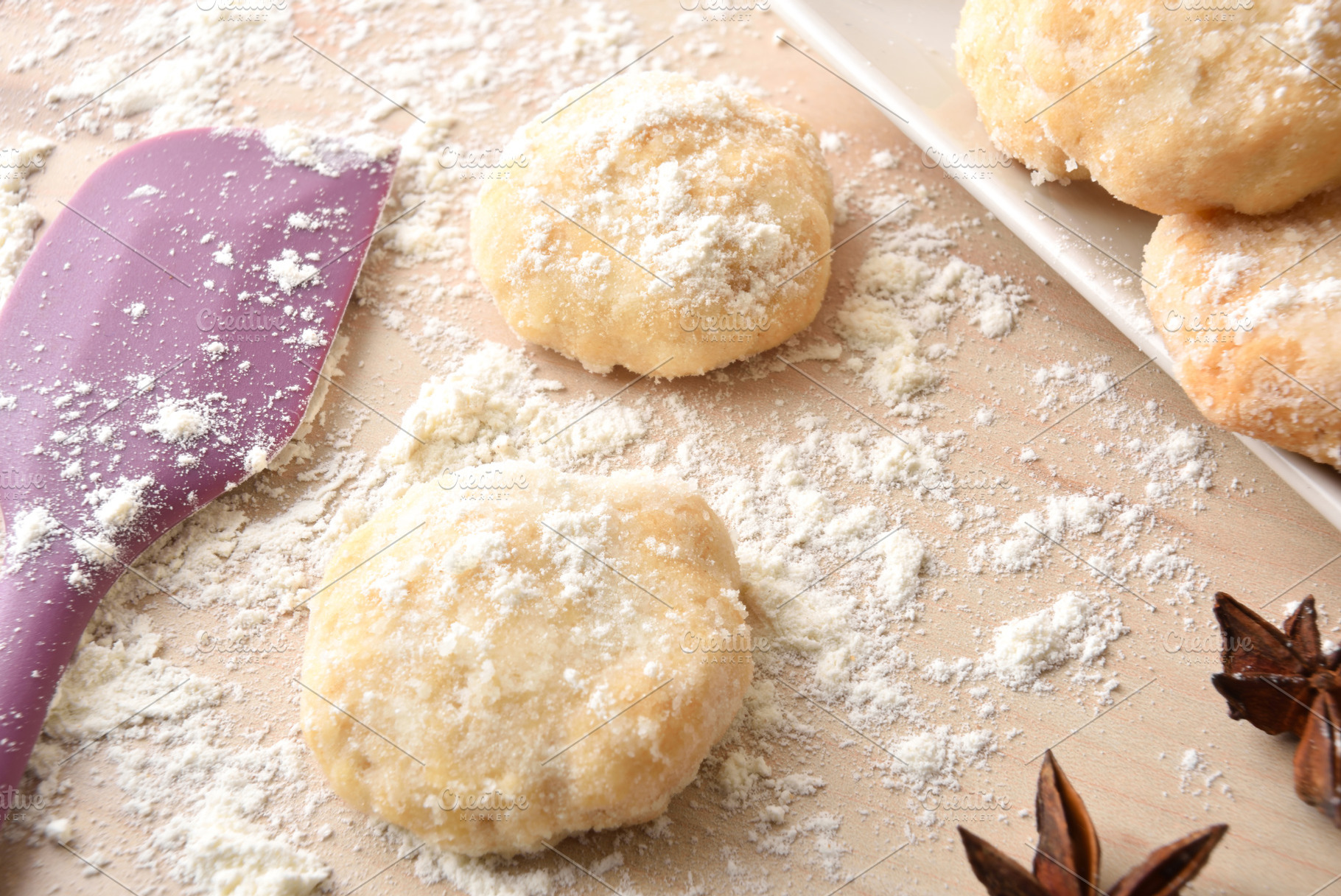 Macro of freshly made anise cookies on wooden bench elevated, a Food & Drink Photo by Davizro's Market