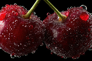Fresh cherries with bubbles in water, a Photo by Beautiful things