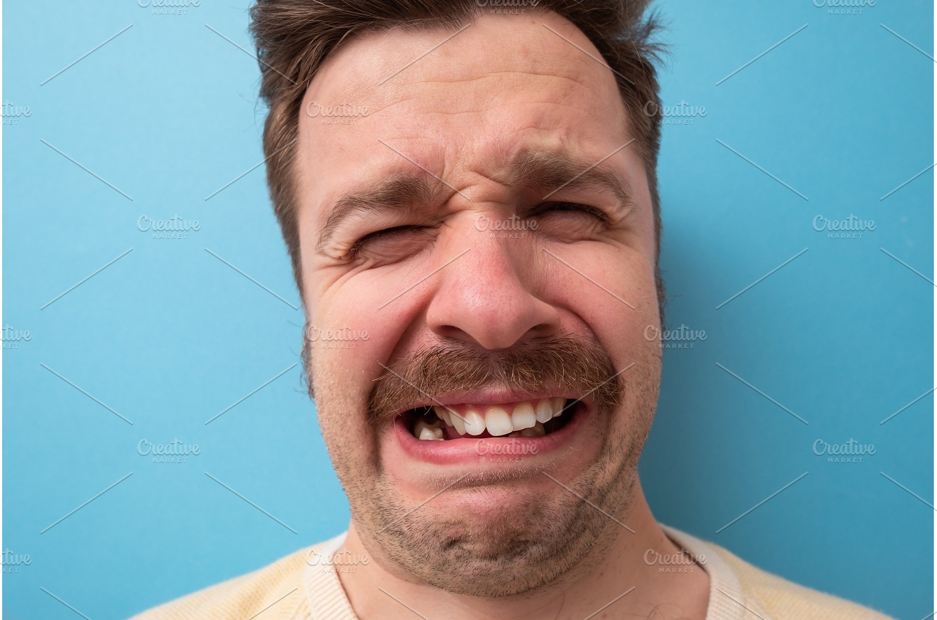 Funny caucasian man crying wipes, a Person Photo by Koldunova