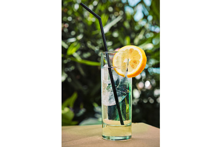 Gin tonic cocktail on cafe table, a Food & Drink Photo by f9photos