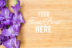 Purple Flowers on Light Wood Mockup
