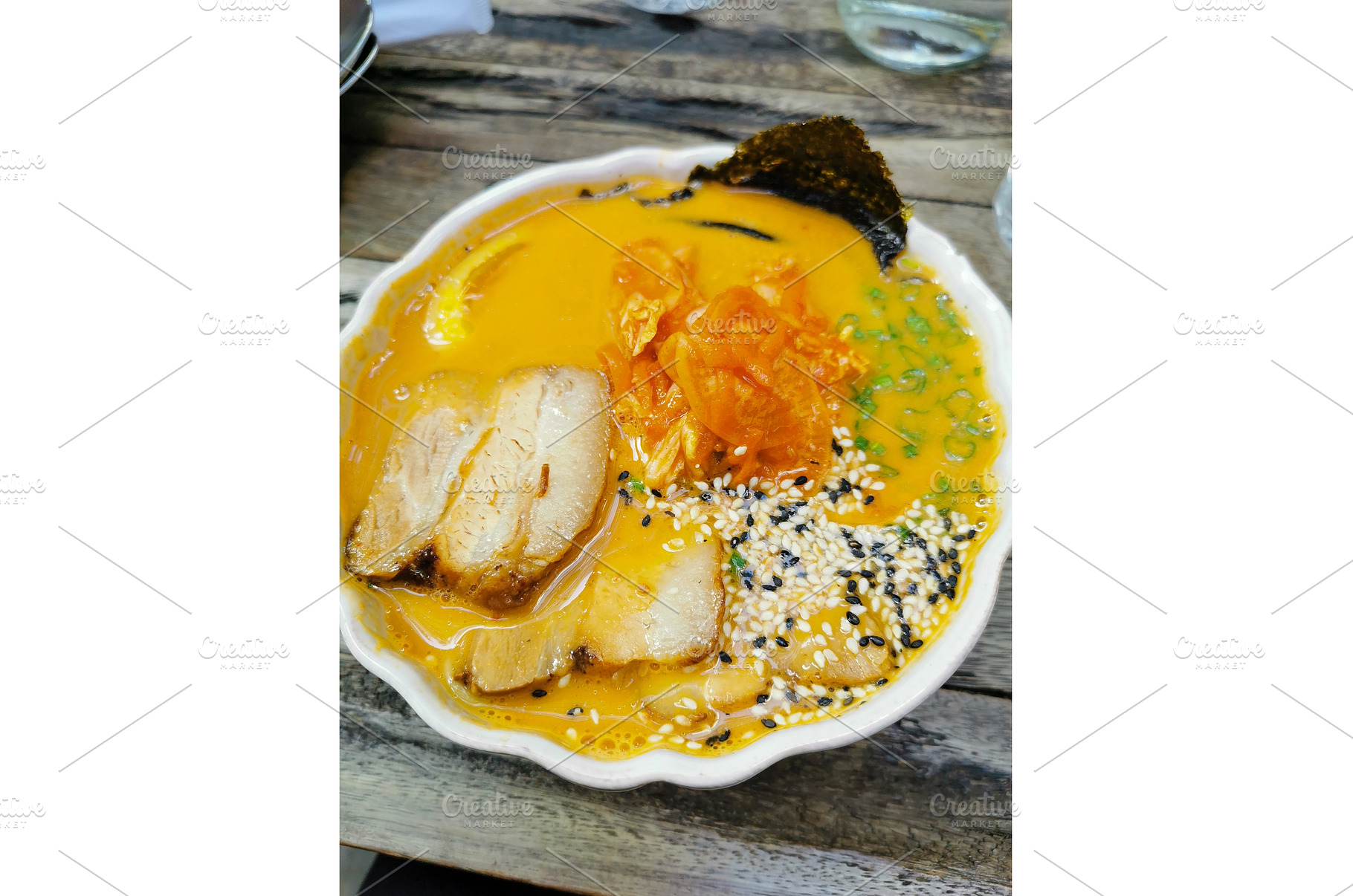 Kimchi ramen in white bowl on wooden, a Food & Drink Photo by sceptical cactus