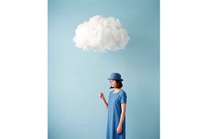 Woman Holds Cloud in Blue Room, a Beauty & Fashion Photo by CREATIVEDEF
