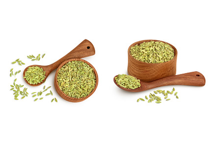 Dried fennel seeds in wooden bowl, a Food & Drink Photo by NataPhoto