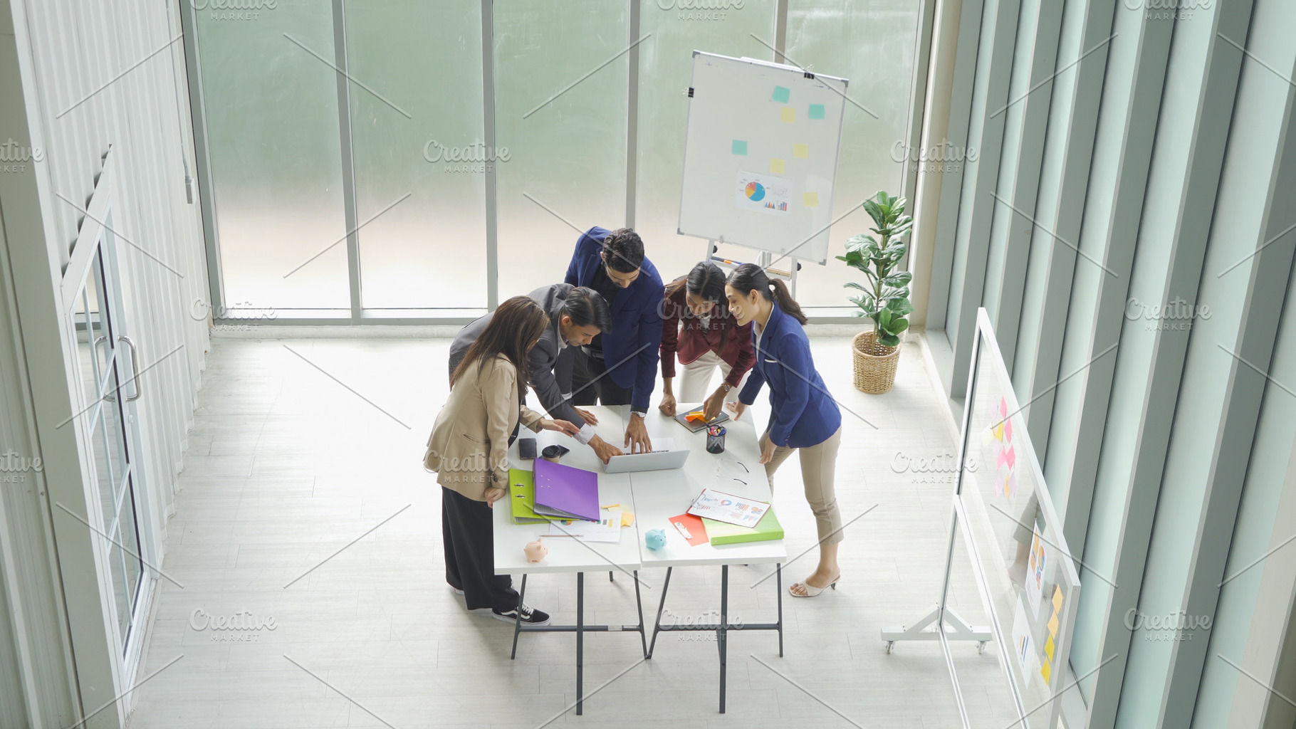 A group of Asian business team talk, communicate, discuss, and w, a Person Photo by Tampatra