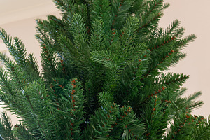 Synthetic Christmas tree branches ready for holiday decoration