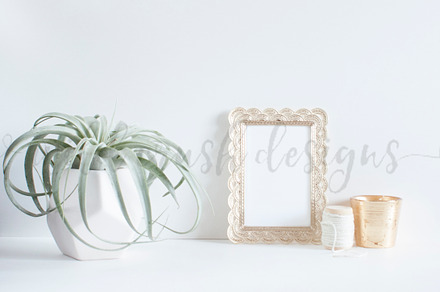 Simple gold frame & candle photo featuring styled stock photography, styling