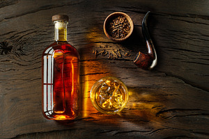 Glass of whiskey, whiskey bottle, a Food & Drink Photo by Volff