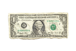 Crumpled dollar isolated on white backgound, a Photo by saiko3p