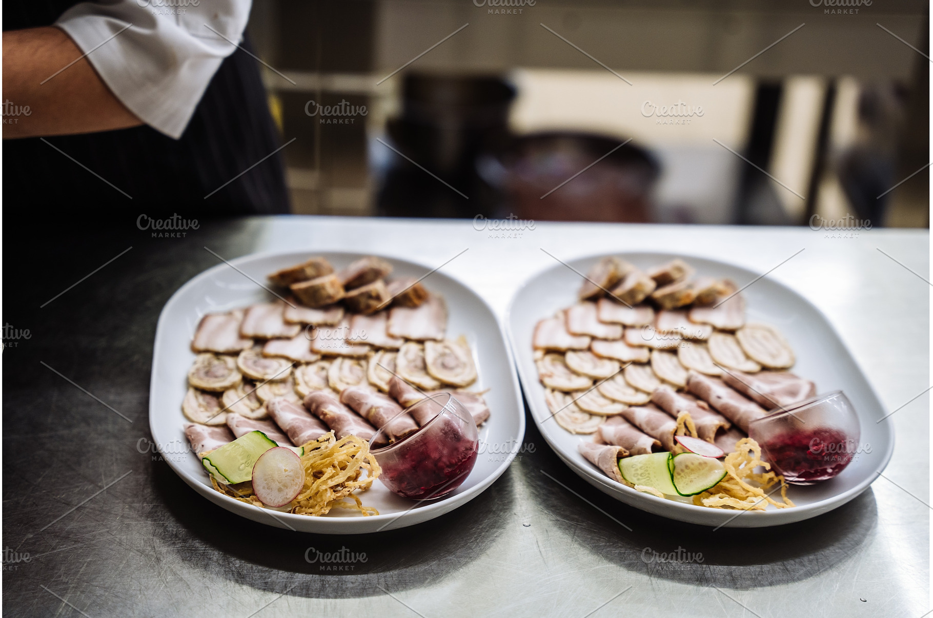 Two plates of assorted meat, a Food & Drink Photo by Red Hot Chili Pepper Shop
