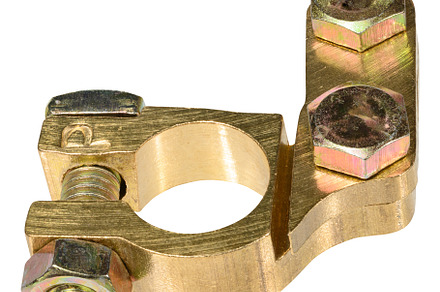 Metal car battery terminal clamp positive or negative, isolated, an Industrial Photo by ndanko