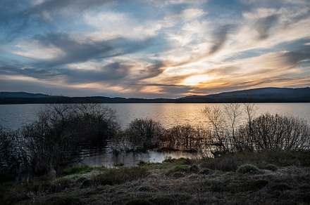 Sunset over beautiful lake, a Background Photo by wr7 Media