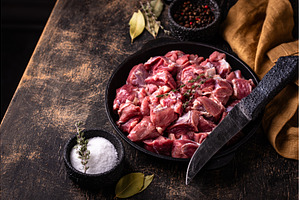 Raw chopped meat with spices, a Food & Drink Photo by Yulia Furman