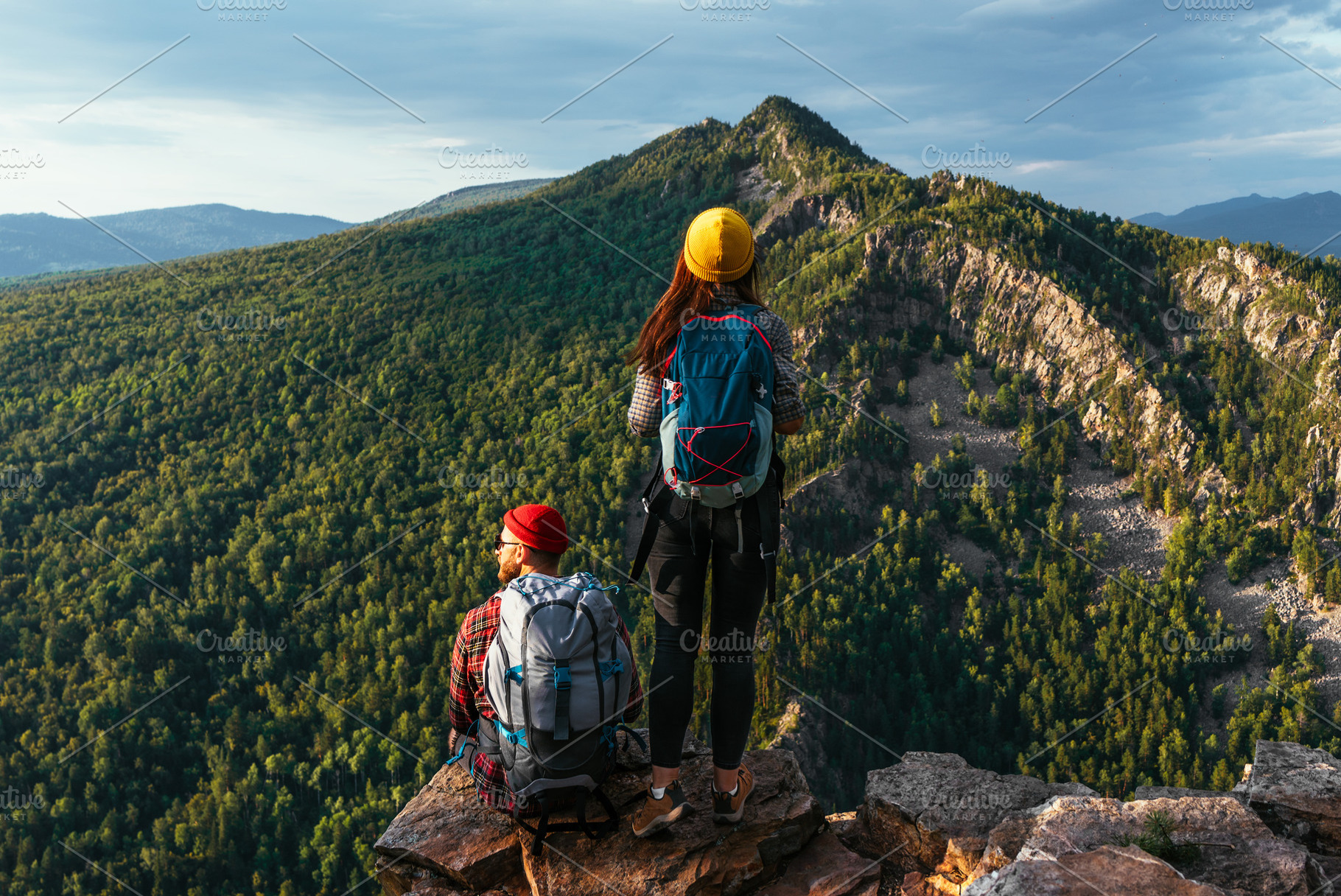 Travelers in the mountains at sunset, a Person Photo by SOTNIKOV_MISHA