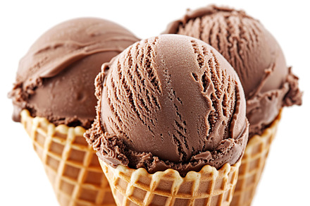 Chocolate ice cream in waffle cones on white background, a Food & Drink Photo by AlyaAnd