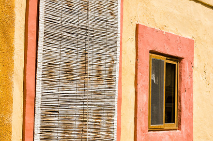 Typical door in Maltese villages with bamboo curtain cover, an Architecture Photo by Angelo D'Amico Photograph
