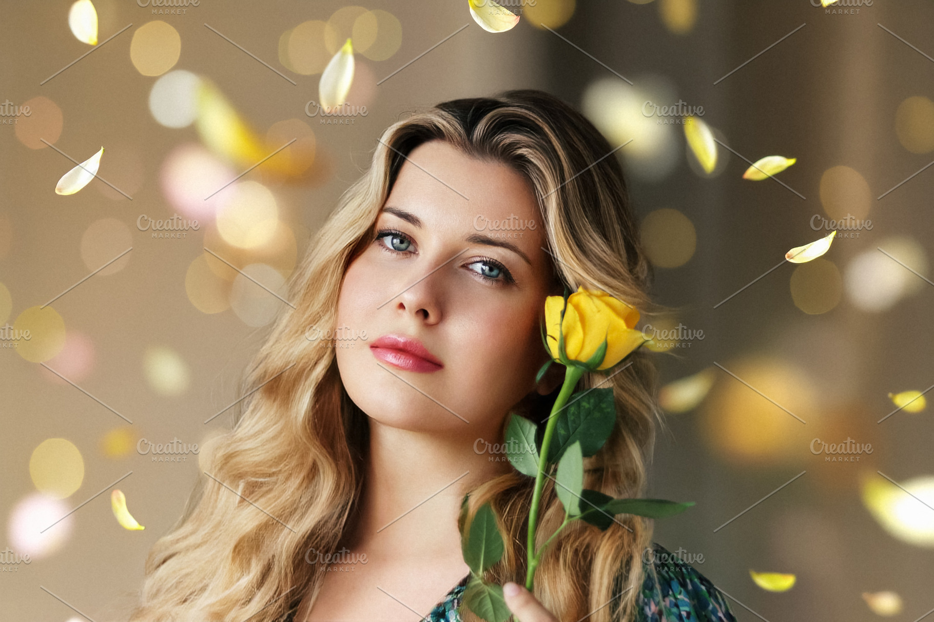 Beautiful woman holding a yellow rose, petals falling and golden, a Person Photo by Studio ANNA