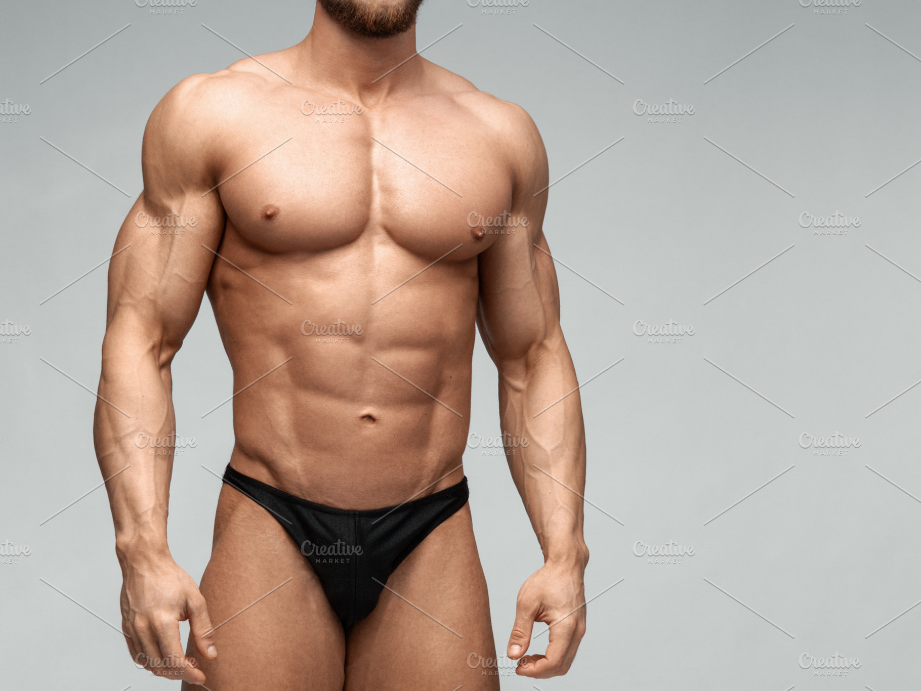 Bodybuilder man with perfect abs stock photo containing muscle and bodybuilder, a Sports & Recreation Photo by sport&beauty stock photo