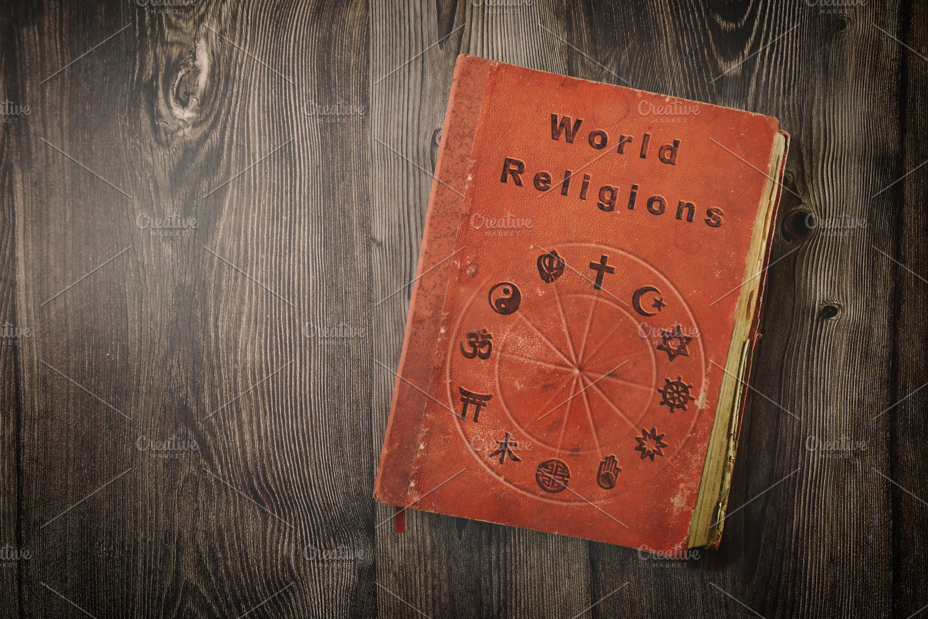 World religions book with symbols on wooden table top view, a School & Education Photo by Davizro's Market