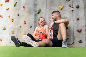 Personal trainer and mature woman resting and talking after outdoor workout ses, a Sports & Recreation Photo by etorres69